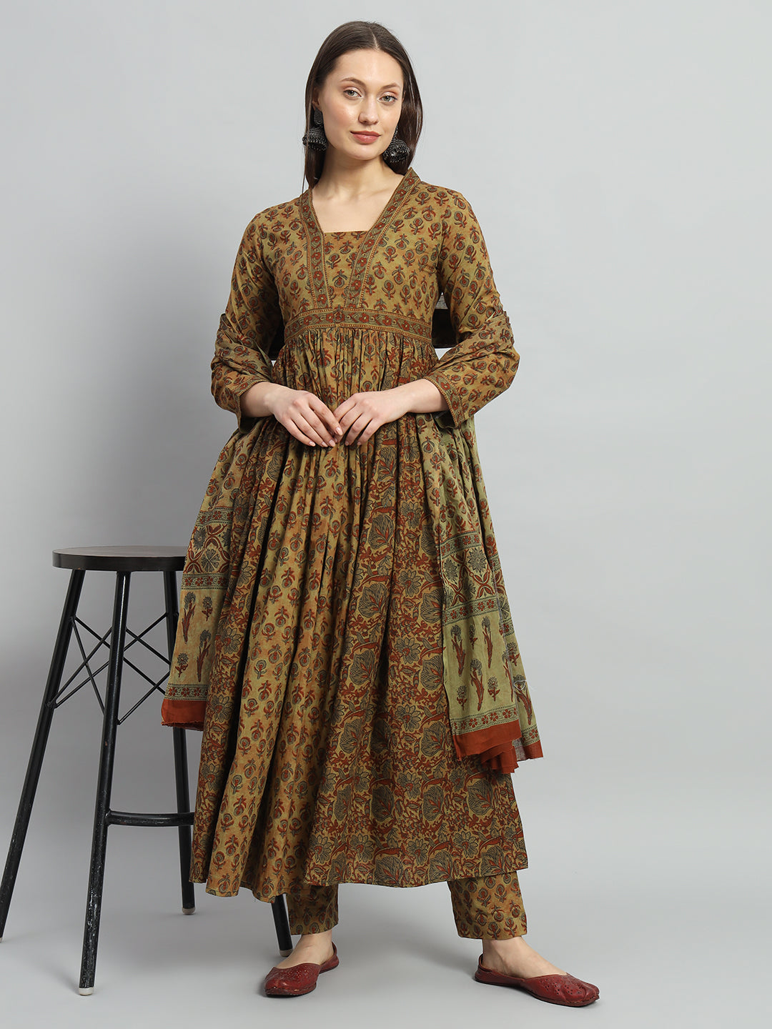 Woman in printed green and brown maternity kurta set with dupatta, comfortable fit