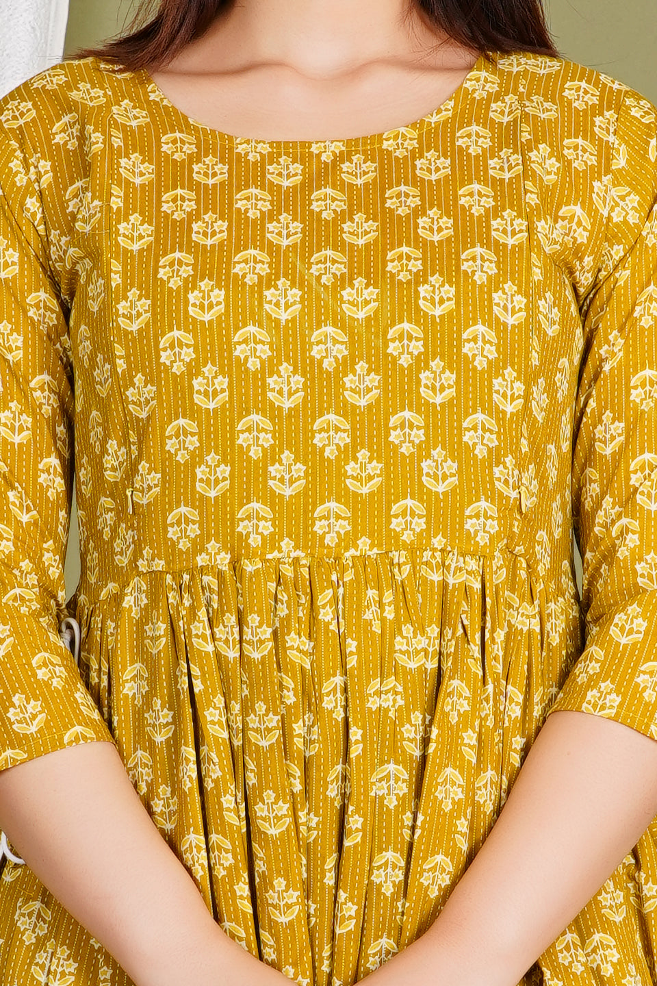 Mustard yellow maternity dress with white floral block print and round neckline